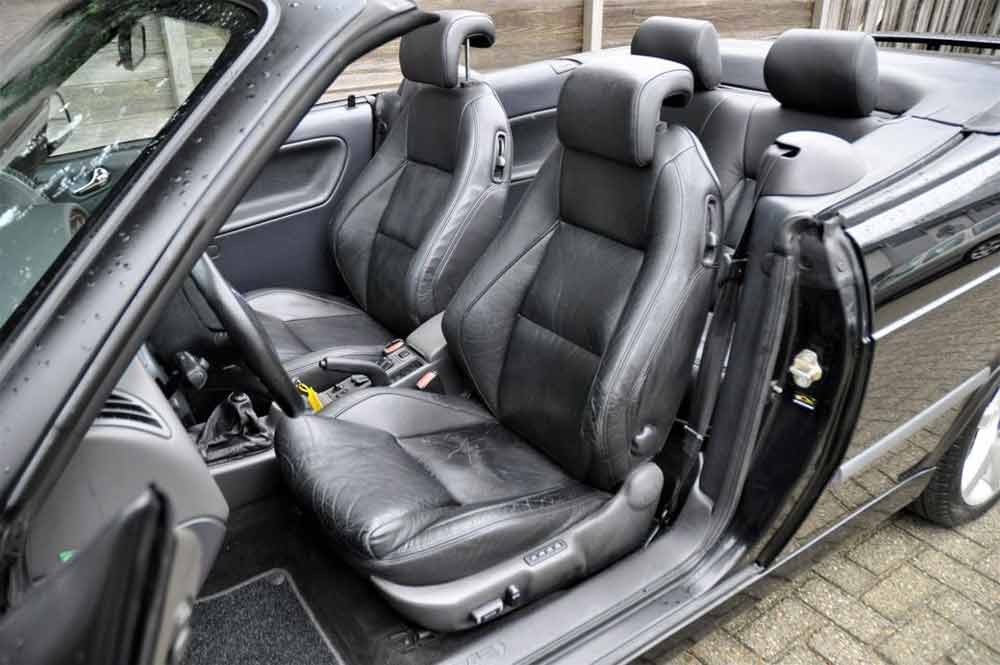 Elegance in Every Detail: Immerse Yourself in Luxury with the Black Leather Interior of the Saab 9-3 Aero Convertible