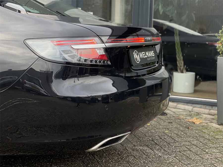 The iconic LED light bar and dual exhausts of the 2010 Saab 9-5 NG Aero XWD highlight its sleek, modern design and performance-focused engineering.