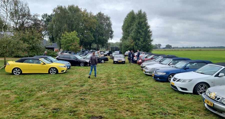 Saab Cabriolets in the parking lot in front of one of the Saab museums