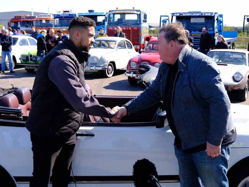 Mike and the delighted potential owner, Theo, seal the deal at £8400 for the Saab 900 Convertible.