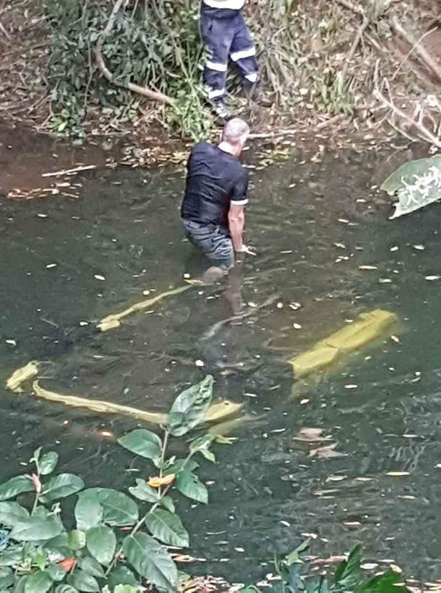 A car on the roof, at the bottom of the river