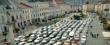 An awe-inspiring aerial shot of Saab Session Slovakia 2024 in Banská Bystrica, featuring a meticulously arranged lineup of Saab models from across Europe.