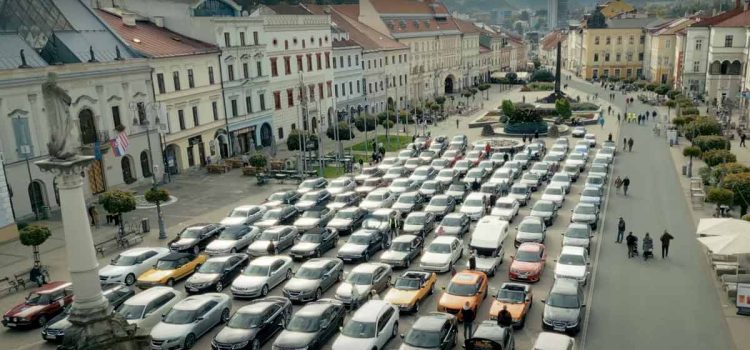 An awe-inspiring aerial shot of Saab Session Slovakia 2024 in Banská Bystrica, featuring a meticulously arranged lineup of Saab models from across Europe.