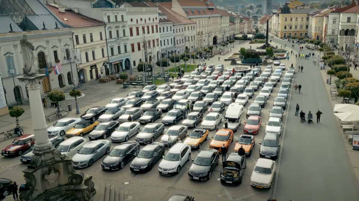 An awe-inspiring aerial shot of Saab Session Slovakia 2024 in Banská Bystrica, featuring a meticulously arranged lineup of Saab models from across Europe.