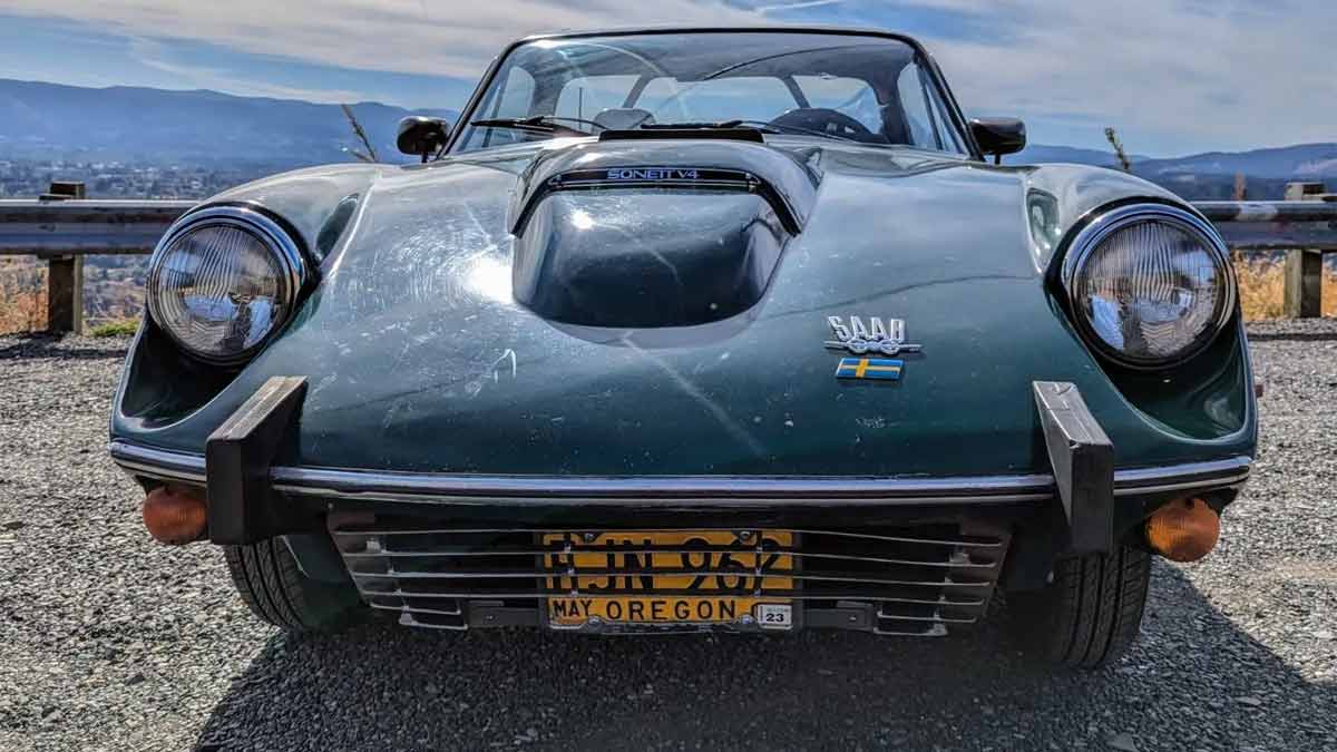 The 1969 Saab Sonett II V4 in a striking green finish—captivating the classic car scene with its vintage appeal and unique design.