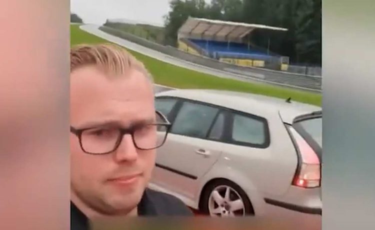 Chasing Dreams: A Dutch Enthusiast Captures the Ultimate Joyride Moment, Posing Proudly with His Saab 9-3 SportCombi on the Iconic Spa-Francorchamps Circuit."