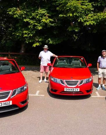 Uniting through their shared passion, Jane Hughes, Vincent O'Brien, and Charles Richards proudly pose with their rare red Saab convertibles, showcasing the timeless elegance of these remarkable vehicles against the backdrop of Formby's picturesque streets. Their chance meeting and love for these classic cars have created an unbreakable bond that continues to flourish in the heart of their tight-knit community.