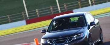 Saab 9-3 TTiD conquering Donington Park—proof that these turbocharged machines still belong on the track.