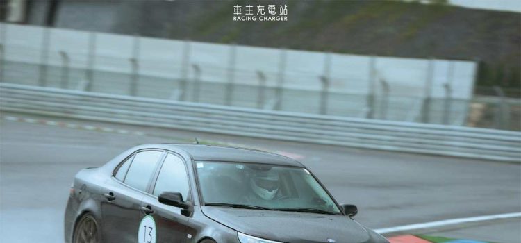 A rare Saab 9-3 Turbo X showcasing its prowess during a track day in Taiwan, braving the wet conditions with its advanced XWD system and performance modifications.