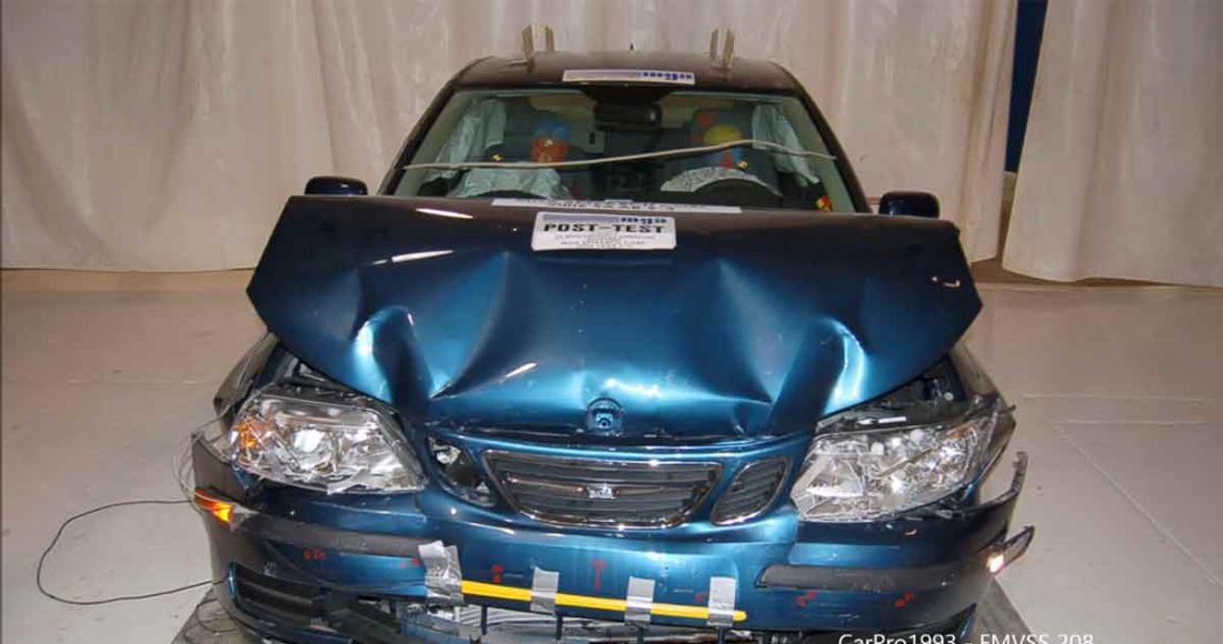 The Saab 9-3 after an unbelted frontal crash test at 40 km/h, showcasing the strength of its passive safety features—protecting occupants even in extreme conditions.