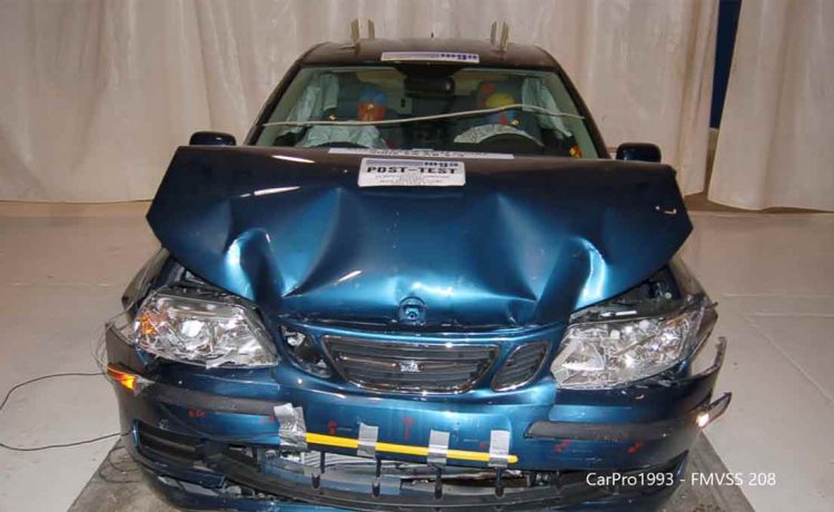 The Saab 9-3 after an unbelted frontal crash test at 40 km/h, showcasing the strength of its passive safety features—protecting occupants even in extreme conditions.