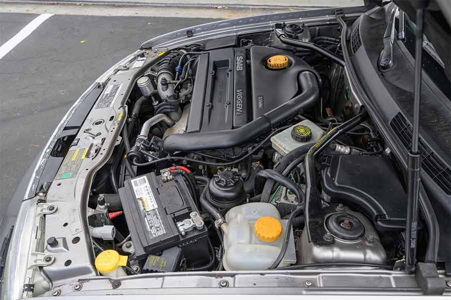 The 2.3-liter turbocharged inline-4 engine of the 2001 Saab 9-3 Viggen Convertible, known for its impressive 230 horsepower and 258 lb-ft of torque