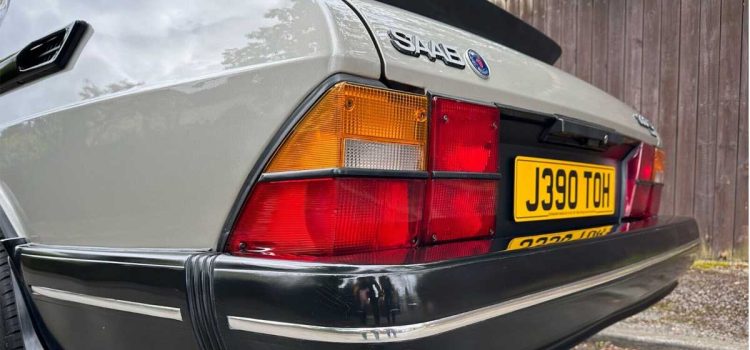 Close-up view of the rear of a 1991 Saab 900 S Turbo, highlighting the distinctive tail lights and classic design.