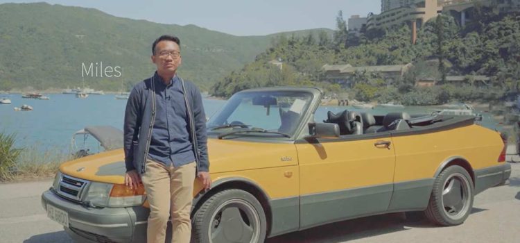 Miles stands proudly next to his rare Monte Carlo Yellow Saab 900 Turbo, a symbol of his passion for vintage cars and a star of Hong Kong's cinematic history.