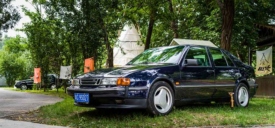 A classic Saab 9000 proudly displayed at the Beijing gathering, highlighting the enduring appeal of Saab's timeless designs. Photo by Li Cheng.