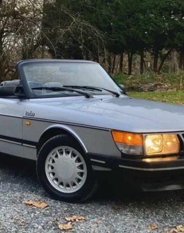 1986 Saab 900 Turbo Convertible 5-Speed in Silver Metallic, Parked Outdoors, Exemplifying Classic Elegance and Timeless Design