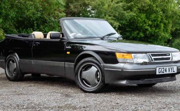 A stunning 1990 Saab 900 T16S FPT Convertible, featuring a sleek black exterior and luxurious cream leather interior, currently up for auction.