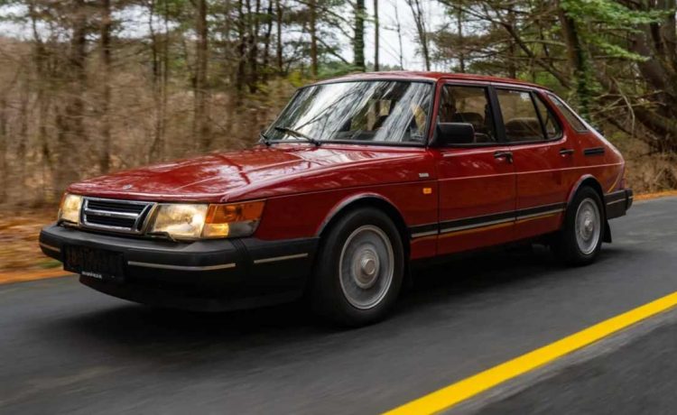 This Cherry Red 1992 Saab 900i, a European import with 136k miles, combines timeless design and practicality for a new generation of enthusiasts.