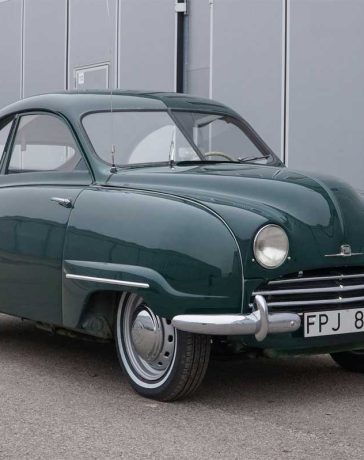 Classic 1955 Saab 92B in dark green, exhibiting vintage charm and timeless Swedish design.