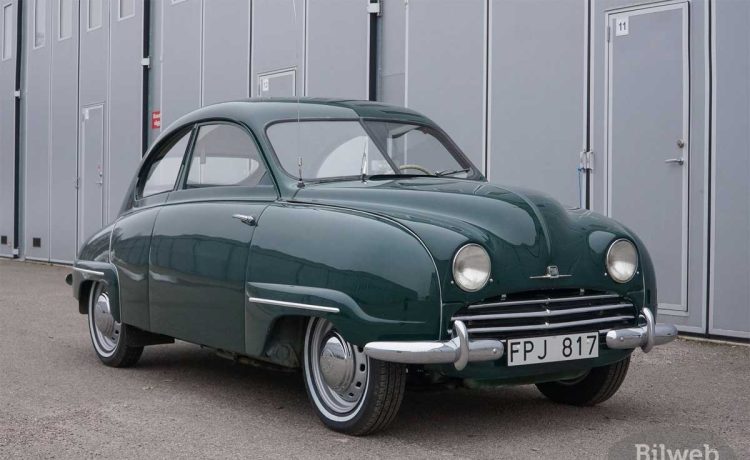 Classic 1955 Saab 92B in dark green, exhibiting vintage charm and timeless Swedish design.