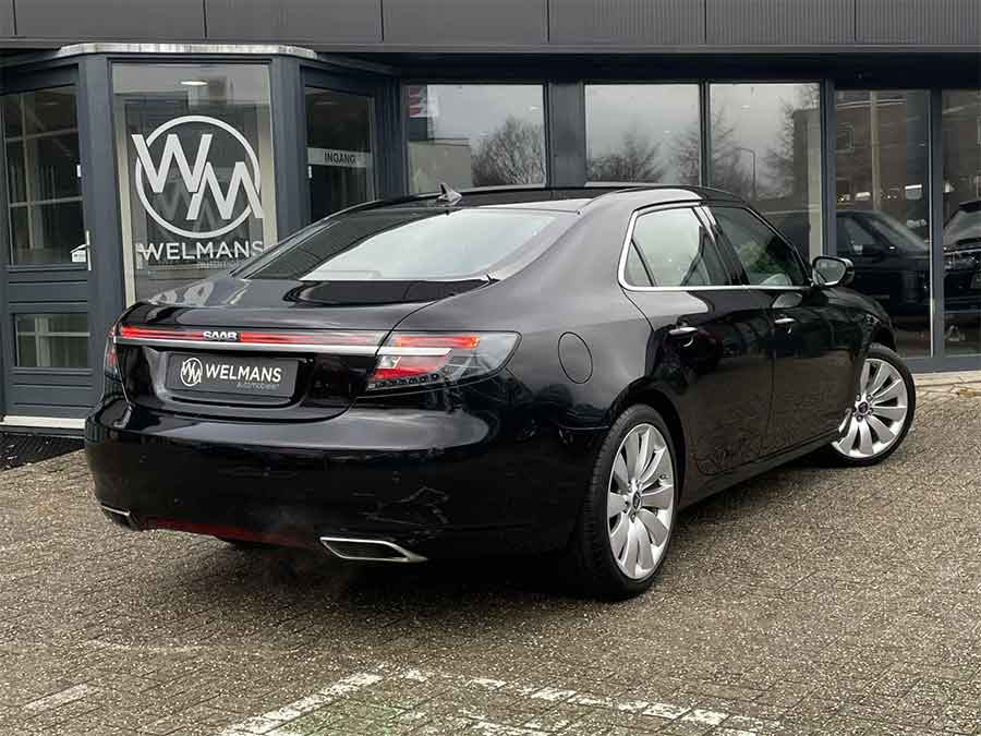 The rear profile of this pristine 2010 Saab 9-5 NG Aero XWD showcases its iconic LED light bar and clean lines, emphasizing Saab’s commitment to timeless design and innovation