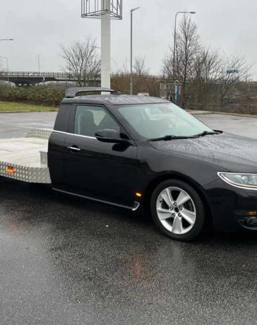 A remarkable transformation – this custom Saab 9-5NG car hauler blends Swedish design with practical utility, creating a unique piece of automotive history.