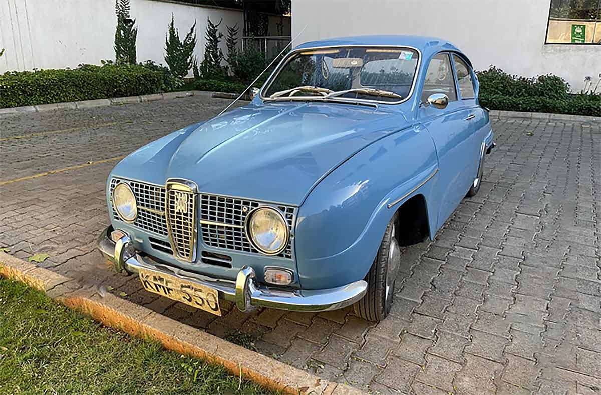 Thomas Frowein’s beautifully restored 1968 Saab 96, set to dazzle attendees at the 2024 Africa Concours d’Elegance in Nairobi. This rare model, renowned for its rally racing heritage and rugged reliability, will be making its first appearance in many years at the prestigious event, celebrating the Alfa Romeo Owners Club’s anniversary.