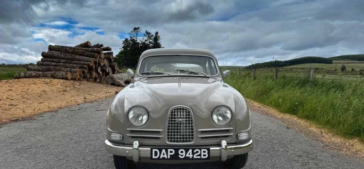 The 1964 Saab 96 in its original Savannabrun finish, a beautifully preserved example of Swedish engineering, now seeking a new owner to continue its storied legacy.