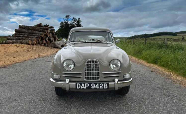 The 1964 Saab 96 in its original Savannabrun finish, a beautifully preserved example of Swedish engineering, now seeking a new owner to continue its storied legacy.