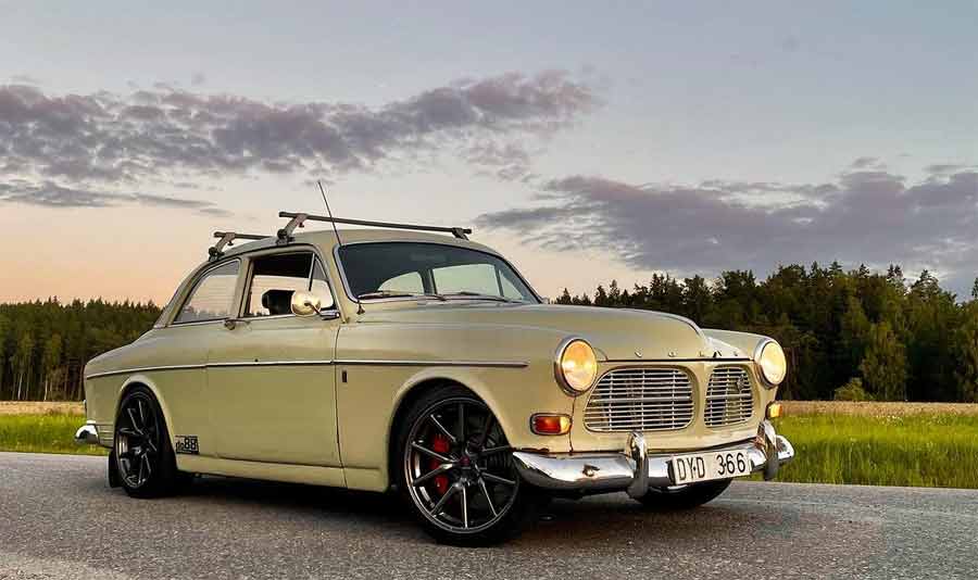 The Saabazon in its glory: A classic Volvo Amazon transformed with a powerful Saab engine, ready to challenge the norms of Swedish engineering.