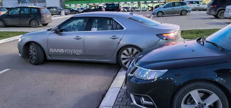 SaabVoyage's iconic 9-5 NG Aero alongside local Saab enthusiasts during a memorable meet-up in Novi Sad.