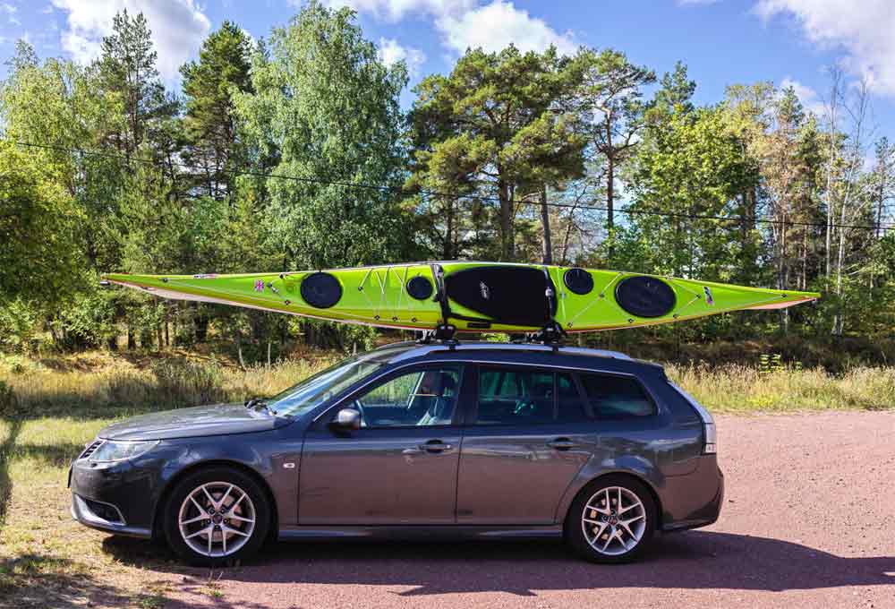 The 2009 Saab 9-3 2.0T XWD Aut SportCombi Aero, equipped with Cross-Wheel Drive (XWD), is the quintessential adventure vehicle for nature enthusiasts. This image captures the essence of freedom and exploration, showing the SportCombi poised on a rugged trail, its silhouette framed against a sprawling, wild landscape.