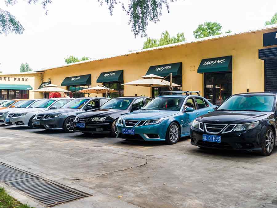 Saab enthusiasts' cars lined up at the 2024 Beijing gathering, reflecting the diverse models and shared passion of the community