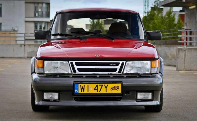 the rare Saab 900 Red Arrow, a limited edition Dutch market model, showcasing its distinctive grey AirFlow body kit and iconic whale tail spoiler.