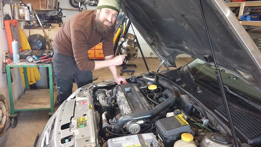 Seppo from Seaside Garage working on a Saab 9-5 Aero Wagon in his latest video, sharing hands-on insights into maintaining this classic estate.