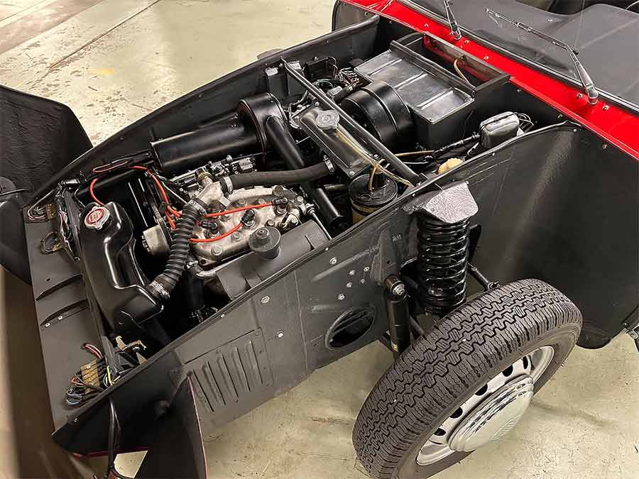 Image Caption:
The heart of the 1966 Saab Sonett II prototype: a meticulously restored 841cc three-cylinder two-stroke engine, delivering 60 horsepower with a lightweight, agile design for peak performance.