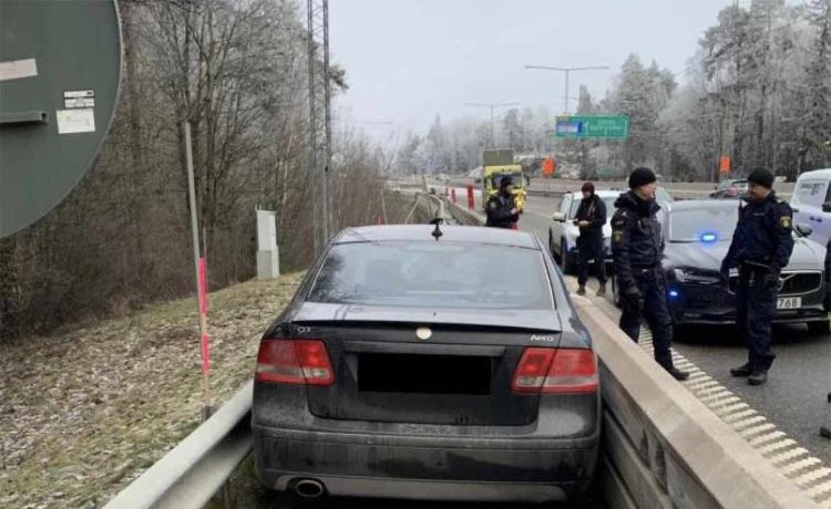 Saab Stuck Between Highway Guardrails