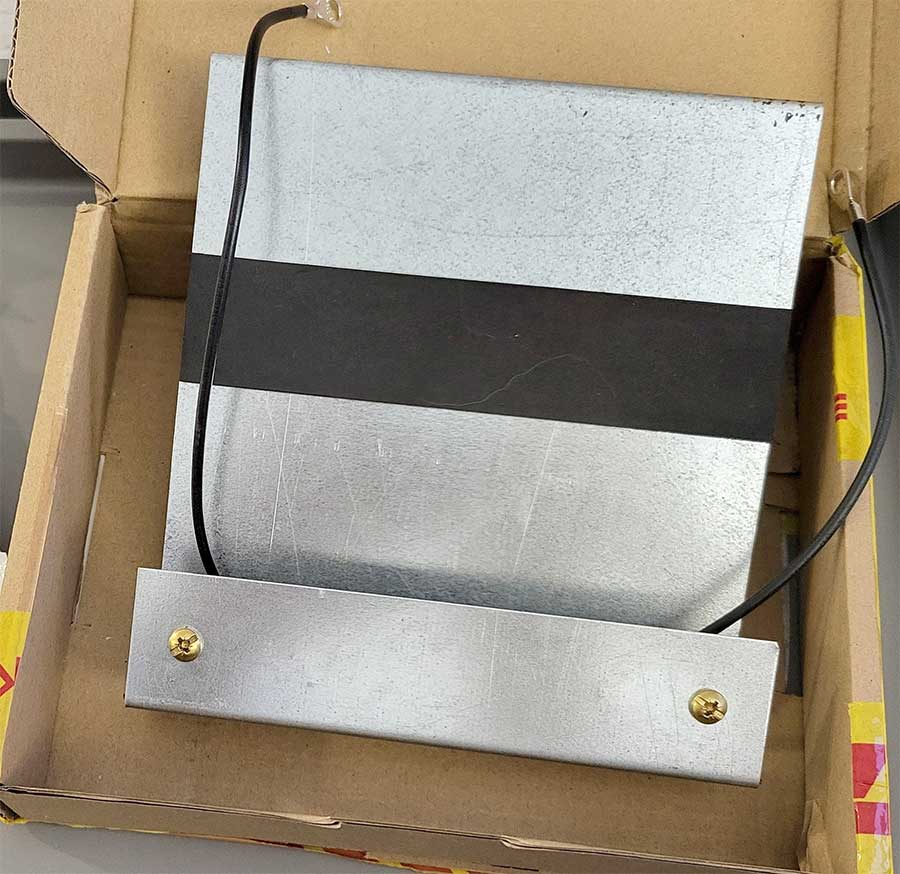 The KM Tronics Saab 9-3 TTiD ECU relocation kit, securely packaged and ready for installation. This affordable and effective solution helps protect your ECU from corrosion, moisture, and vibrations, significantly extending its lifespan.