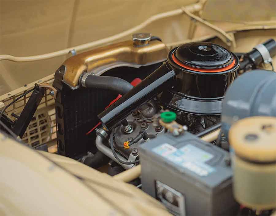 The heart of the 1966 Saab 96—its legendary 841cc three-cylinder two-stroke engine—meticulously restored to deliver its signature high-revving power and distinctive sound.