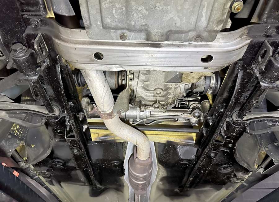 Shots of the meticulously maintained underside reveal the thick protective urethane coating—underscoring how this Saab has remained nearly factory-fresh after just 26k miles.