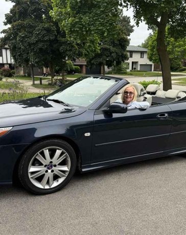 Vicki Griffiths enjoys the freedom of driving through the Caledon Hills in her navy blue 2008 Saab 9-3 Convertible with the top down.