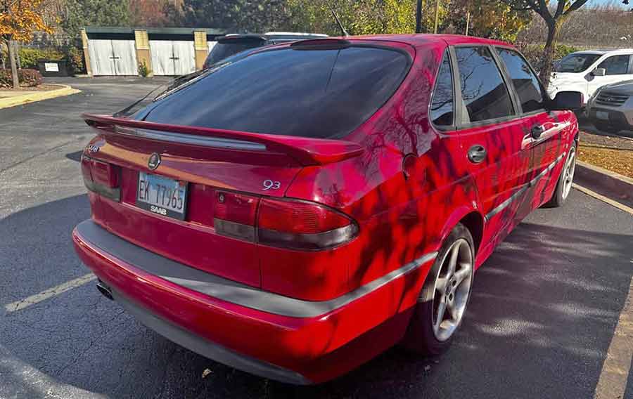 The rear of this 2002 Saab 9-3 Viggen 5-door showcases its signature aerodynamic wing, turbocharged performance, and timeless Swedish design, making it a rare find for Saab enthusiasts.