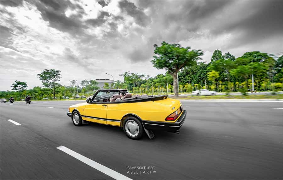 Yellow Saab 900